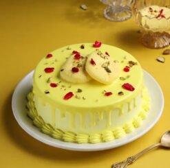Rasmalai Rose Petals Cake — luxurious cake topped with rasmalai, saffron cream, and delicate rose petals for a royal treat.