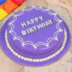 Halloween-themed birthday cake with spooky decorations like ghosts, pumpkins, bats, and spider webs.