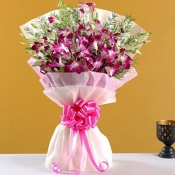 Fresh lavender orchids bouquet wrapped in elegant paper.