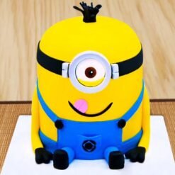 Naughty Minion Fondant Cake — 3D Minion-themed cake with expressive fondant detailing, perfect for children's birthdays.