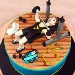 Workout Special Gym Cake — gym-themed cake with dumbbells, kettlebells, and fitness decorations, perfect for fitness celebrations.